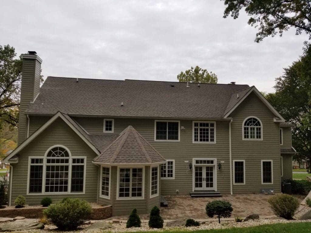 Beautiful home in Devon, PA received James Hardie Beaded Siding in Stucco Replacement
