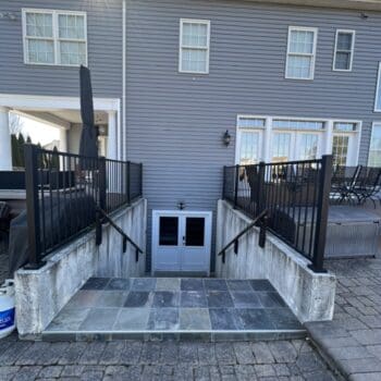 Deck and stairs of Kong home after a stucco to CertainTeed siding transformation in Harleysville PA