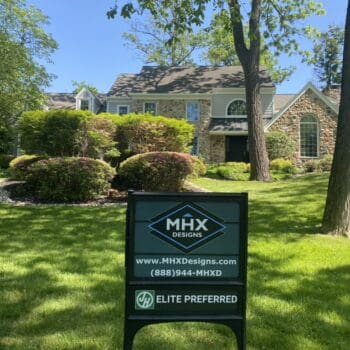 Front of Villanova PA after stucco to james hardie installation with MHX sign